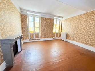 Immeuble à usage commercial et d'habitation centre-ville