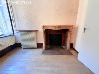 Maison ancienne avec garage et jardin