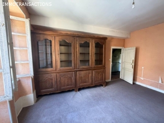 Maison ancienne avec garage et jardin