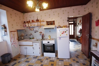 Maison ancienne de village avec garage et jardin